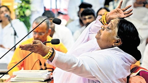 Mata Amritanandamayi addressing devotees during the Brahmasthanam festival at Kaimanam in Thiruvananthapuram on Saturday.