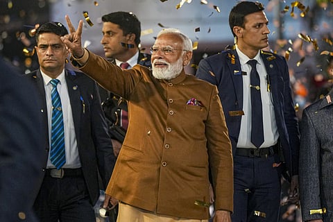 Prime Minister Narendra Modi being welcomed upon his arrival after the BJP won the Delhi Assembly election, at the party HQ in New Delhi, Saturday, Feb. 8, 2025.