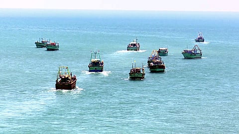 Fishermen fishing with their boats in Rameshwaram.