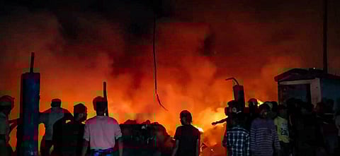 A massive fire that broke out at Narkeldanga slum area in Kolkata, Saturday night, Feb. 8, 2025.