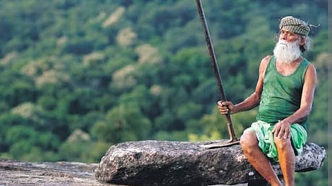 His dedication was evident in his signature attire—always dressed in a green shirt, green lungi, and green headband, symbolising his deep connection to nature.