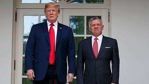President Donald Trump stands with Jordan's King Abdullah II at the White House, June 25, 2018, in Washington.