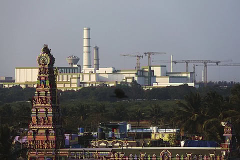 A temple stands in the foreground of the Madras Atomic Power Station located at Kalpakkam in Tamil Nadu, Monday, Feb 10, 2025.