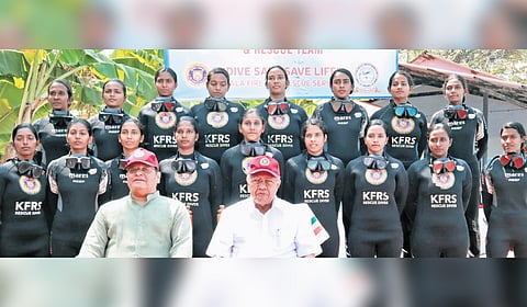 The 17-member team of women scuba rescuers with Chief Minister Pinarayi Vijayan and Kerala Fire and Rescue Services Director General K Padmakumar