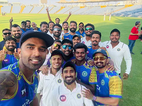 Kerala team members pose for a selfie after advancing to the Ranji Trophy semifinals in Pune on Wednesday