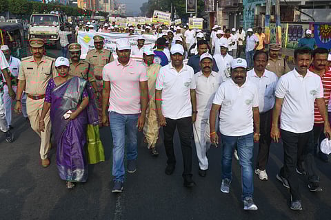 Students take part in a traffic awareness rally organised by the district transport department where NTR district collector G Lakshmisha, VMC commissioner Dhyanchandra also present in Vijayawada on Tuesday.