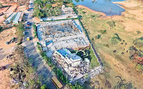 An aerial view of HYDRAA officials, with the help of a JCB, demolishing the Prakruti Resorts and Prakruti Convention centre at Devaryamjal village, Medchal-Malkajgiri district on Thursday