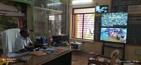 Headmaster K Muthuselvan monitoring different parts of the campus from his
office in Government Model Girls Higher Secondary School at Manachanallur.