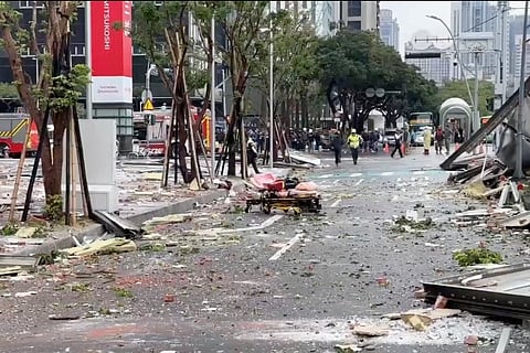 This image taken from video by Taiwan's TVBS shows the debris are strewn across the streets in the aftermath of an explosion at the Shin Kong Mitsukoshi department store in Taichung city in Taiwan on Thursday.