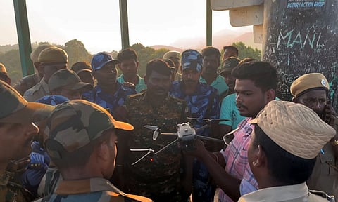Field-level staff of Gudalur forest division in the Nilgiris district get drone operation training.