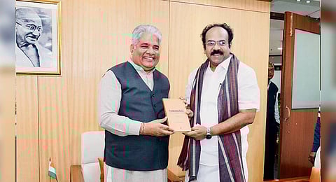 Thangam Thennarasu with Bhupender Yadav.