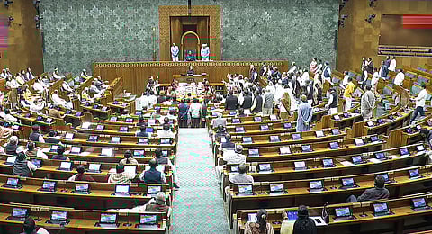 Opposition MPs protest in the Lok Sabha during the Budget session of Parliament, in New Delhi, Thursday, Feb. 13, 2025.