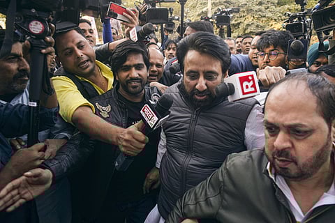 AAP MLA Amanatullah Khan arrives at a police station, in New Delhi, Thursday, Feb. 13, 2025.