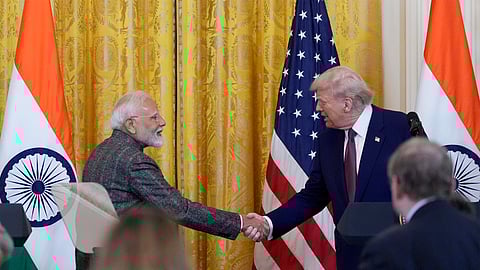 US President Donald Trump and Prime Minister Narendra Modi shake hands during a news conference in the East Room of the White House, Thursday, Feb. 13, 2025, in Washington.