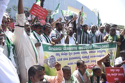 JDS members staged a protest against the Metro Fare hike at Freedom park in Bengaluru on Friday.