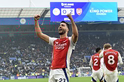 Arsenal's Mikel Merino celebrates after scoring his side's second goal during the English Premier League match against Leicester City at King Power stadium in Leicester (Photo | AP)
