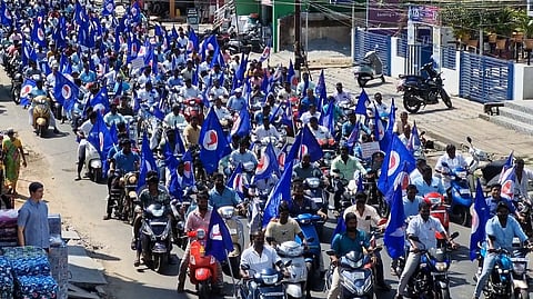 Hundreds of fisherfolk took out a bike rally in Karaikal on Sunday demanding the repatriation of three fishermen injured in Sri Lankan naval firing on January 27.