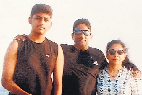 Chethan (centre) along with his wife Rupali and son Kushal.