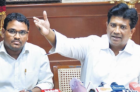 MLA Ezhilan Naganathan during a press briefing at the DMK headquarters