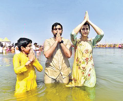 IT and HRD Minister Nara Lokesh along with his wife Brahmani and son Devansh took a dip at Prayagraj during Maha Kumbh Mela on Monday