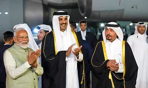 Prime Minister Narendra Modi receives the Amir of Qatar Sheikh Tamim Bin Hamad Al-Thani upon his arrival in India in New Delhi (Photo | PTI)