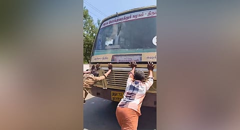 TNSTC bus being pushed by passengers