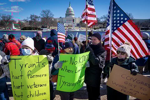 People take part in the "No Kings Day" protest on Presidents Day in Washington, in support of federal workers and against recent actions by President Donald Trump and Elon Musk