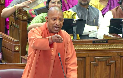 Uttar Pradesh Chief Minister Yogi Adityanath speaks in the House during the Budget session of UP Assembly, in Lucknow, Tuesday, Feb. 18, 2025.