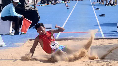 A para-athlete in action during the men's long jump final on Wednesday
