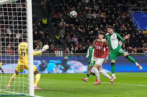 Feyenoord's Julian Carranza scores his side's first goal during Champions League, playoff second leg soccer match between AC Milan and Feyenoord, at the San Siro stadium in Milan, Italy, Tuesday, Feb.18, 2025.