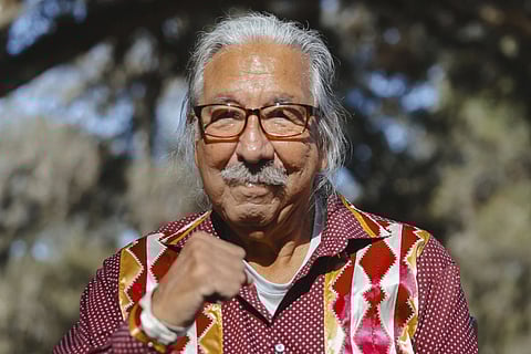 In this photo released by NDN Collective, Native American activist Leonard Peltier poses for pictures as he was released from Florida prison on Tuesday, Feb 18, 2025.