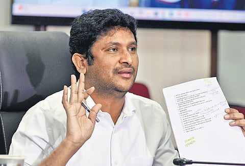 AP fibernet chairman GV Reddy addressing the media during the press conference in Vijayawada on Thursday.