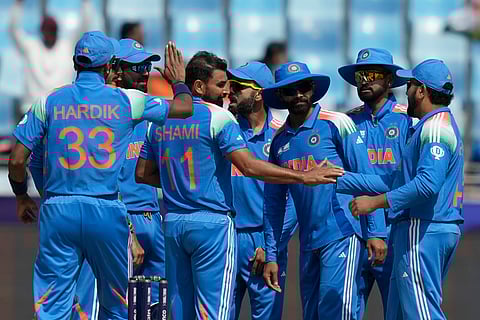 Mohammed Shami, fourth left, celebrates with teammates after the dismissal of Bangladesh's Soumya Sarkar during the Champions Trophy match in Dubai (Photo | AP)