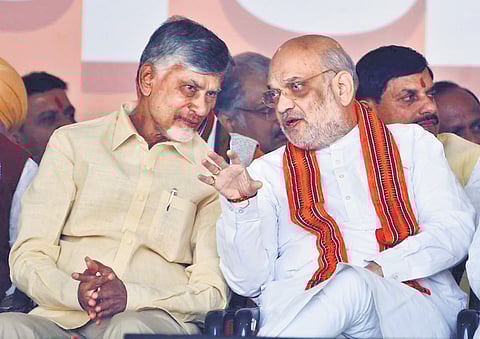 Chief Minister Nara Chandrababu Naidu interacting with Union Home Minister Amit Shah during the swearing-in ceremony of Delhi Chief Minister on Thursday