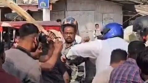 Screengrab of MP Rakibul Hussain being attacked.