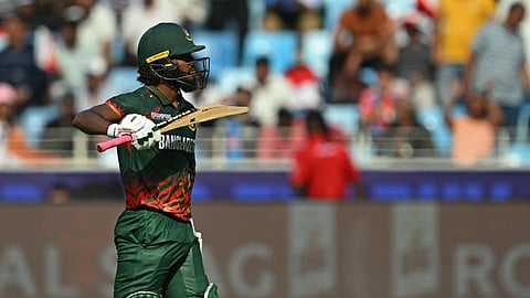 Jaker Ali celebrates his fifty against India in Dubai on Thursday