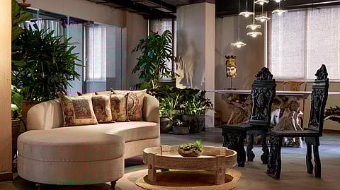 Reception area featuring a striking mid-century modern sofa