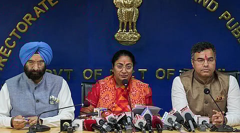 Delhi CM Rekha Gupta, centre, addresses her first press conference as the CM with cabinet ministers Manjinder Singh Sirsa, left, and Parvesh Verma, after the cabinet meeting of the new government at the Delhi Secretariat, in New Delhi, Thursday, Feb. 20, 2025.