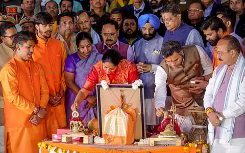 Newly sworn-in Delhi Chief Minister Rekha Gupta with BJP National Vice President Baijayant Jay Panda, state party President Virendra Sachdeva, Minister Parvesh Verma and others during Yamuna 'Aarti', at Vasudev Ghat in New Delhi, Thursday, Feb. 20, 2025.