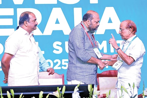 Indian Union Muslim League national general secretary (R) P K Kunhalikutty interacts with Industries Minister P Rajeeve during the valedictory function of the Invest Kerala Global Summit on Saturday. Finance Minister K N Balagopal looks on