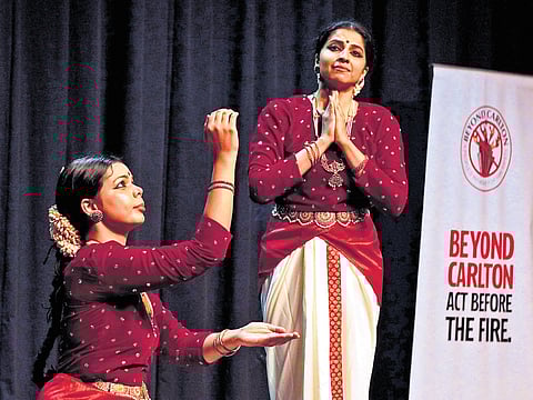 Dancer Matangi Prasan (standing)performs ‘Agni: Respect and Neglect’, a Bharatanatyam performance during the memorial event of Carlton Towers fire on Saturday