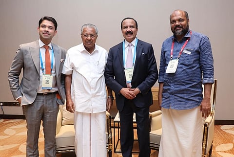 Dr Azad Moopen and Anoop Moopen with Kerala chief minister Pinarayi Vijayan and Industries minister P Rajeev.