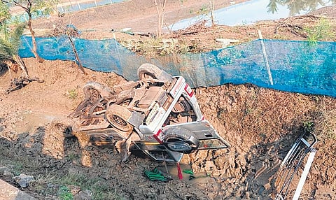 The ill-fated vehicle lying in the dry creek following the accident