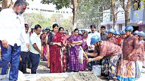 District Collector Valluru Kranthi oversees women making cement bricks in Sangareddy