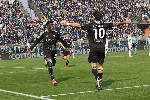 Como's Diao Diaoune Assane celebrates after scoring during the Italian Serie A between soccer match between Como and Napoli at the Giuseppe Sinigaglia stadium in Como.