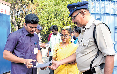 M Mamatha, an aspirant, arrives in the bridal attire to appear for the APPSC Group 2 Main examination at SPW College in Tirupati on Sunday