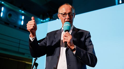 Friedrich Merz, leader of Germany's conservative Christian Democratic Union (CDU) and his party's main candidate for Chancellor addresses supporters at the electoral evening in Berlin on February 23, 2025