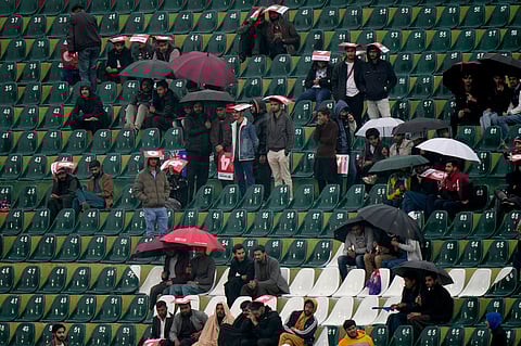 Fans wait ahead of the ICC Champions Trophy match between Australia and South Africa in Rawalpindi (Photo | AP)