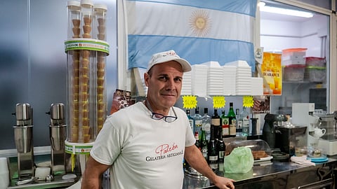 Sebastian Padrón, from La Plata, Argentina, poses in his ice cream in Rome, Tuesday, Feb. 25, 2025.