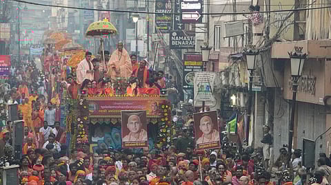 Naga sadhus take out a procession towards the Kashi Vishwanath temple to offer prayers on the occasion of Maha Shivratri, marking the concluding day of the Mahakumbh, in Varanasi.